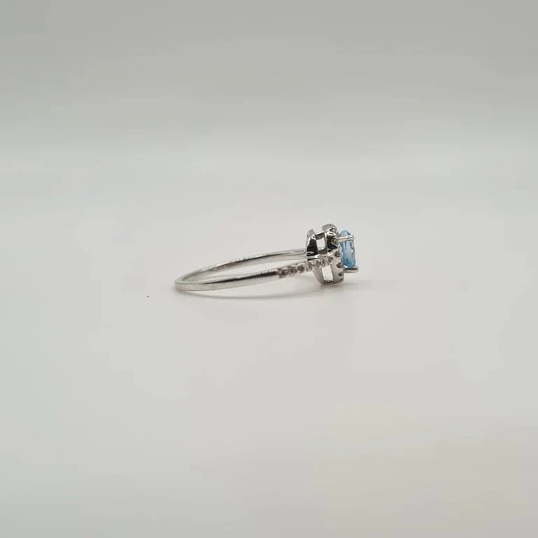 White gold heart ring set with a blue topaz and diamonds  - Image 5